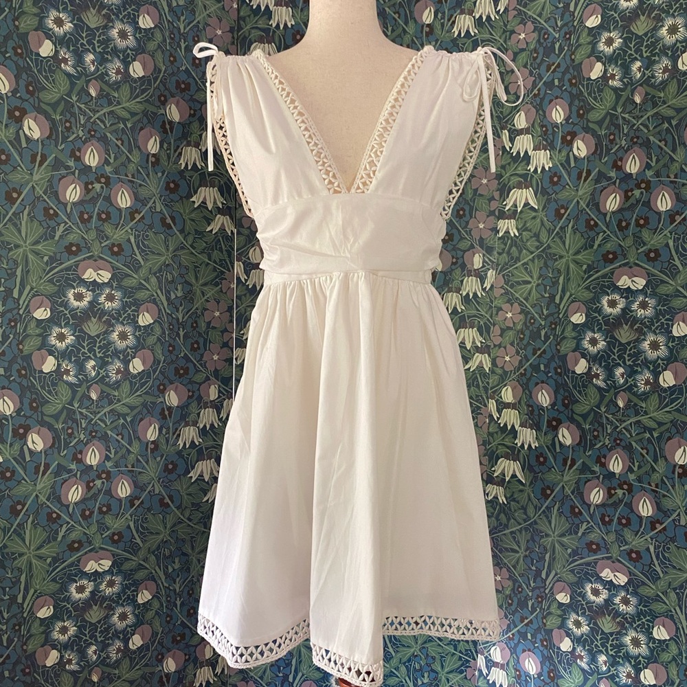 Cute white dress with drawcord strings at shoulders